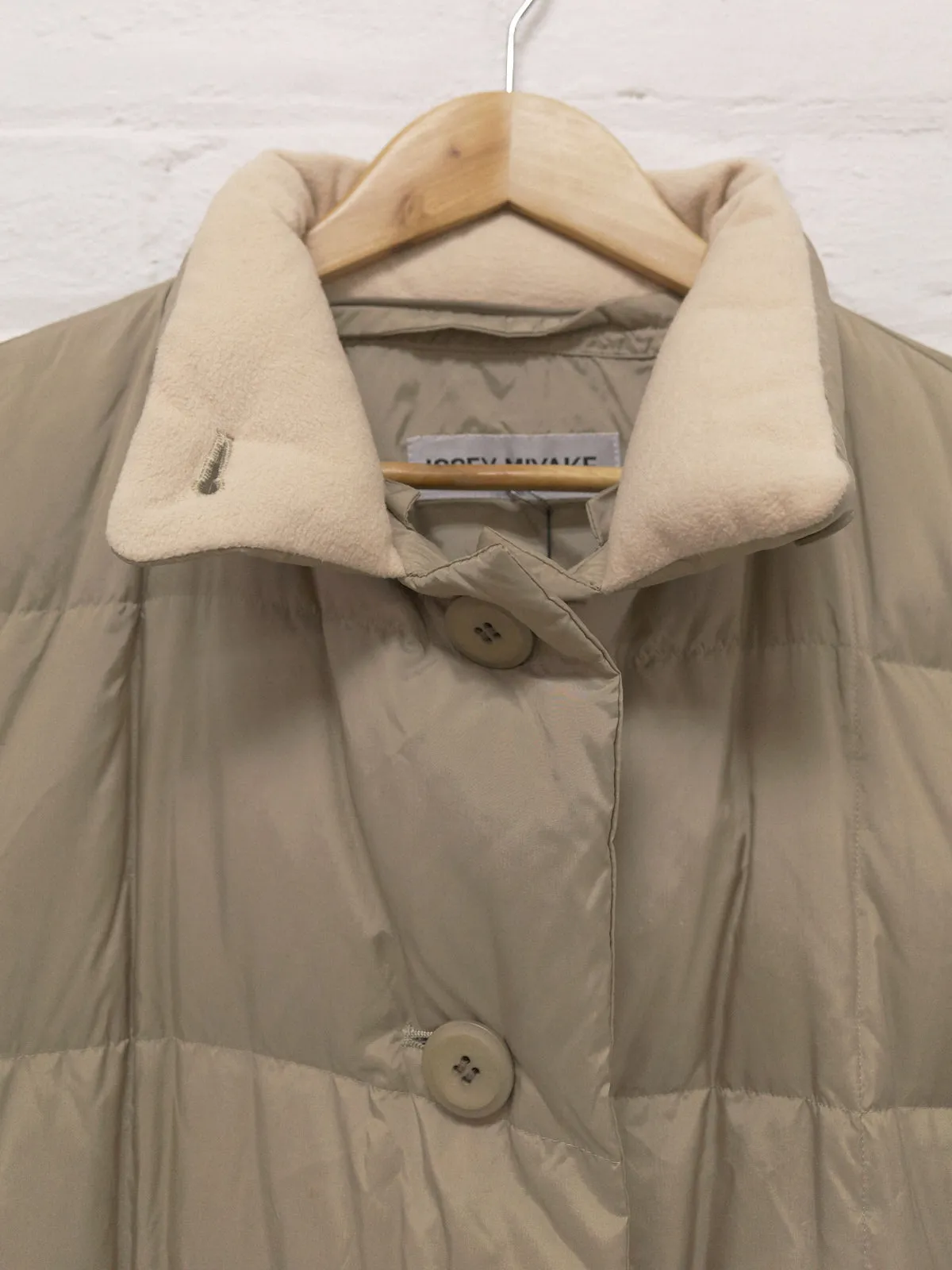 Issey Miyake beige high neck down puffer coat - size M