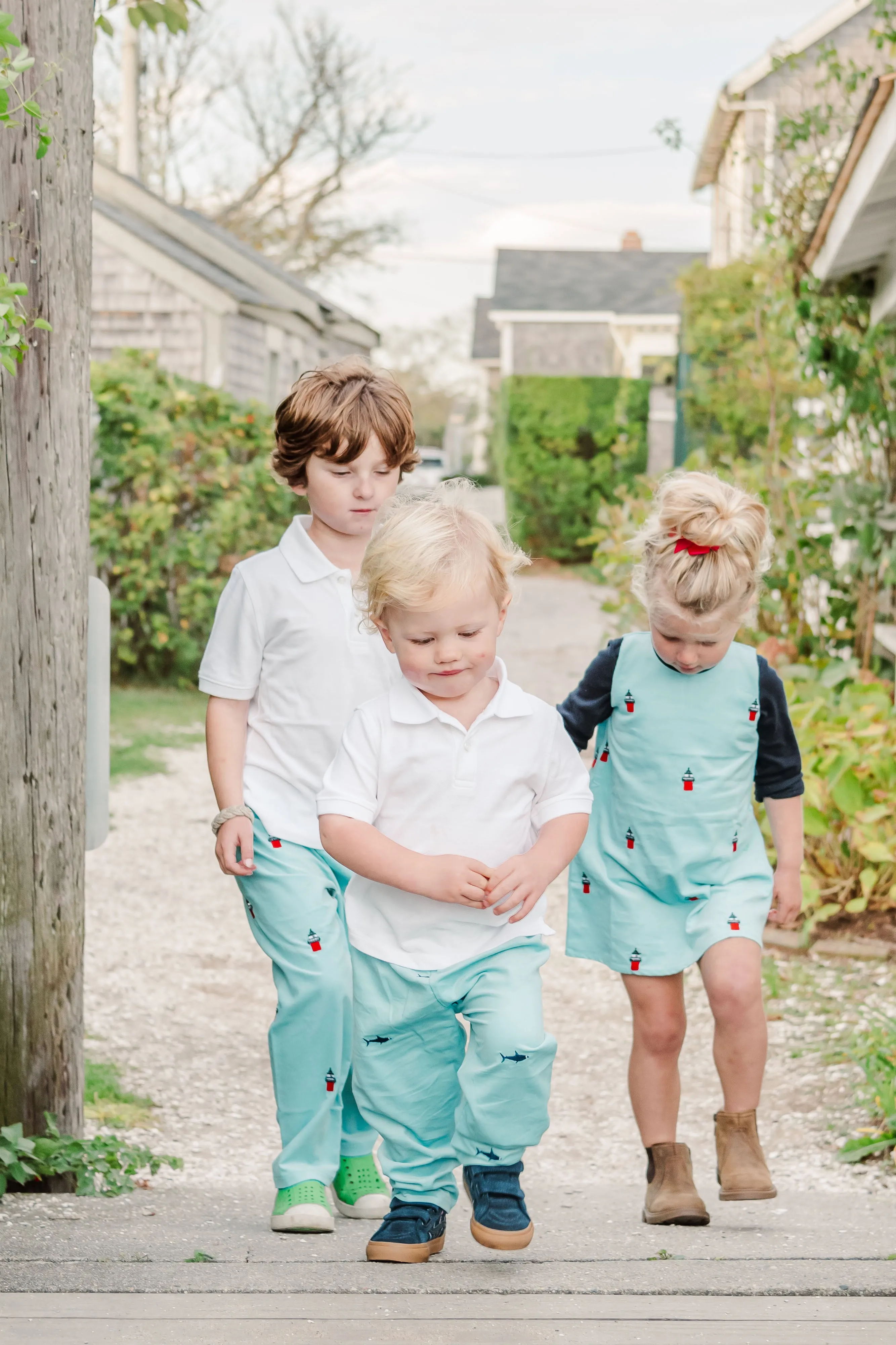 Turquoise Corduroy Jumper Dress with Embroidered Bug Light